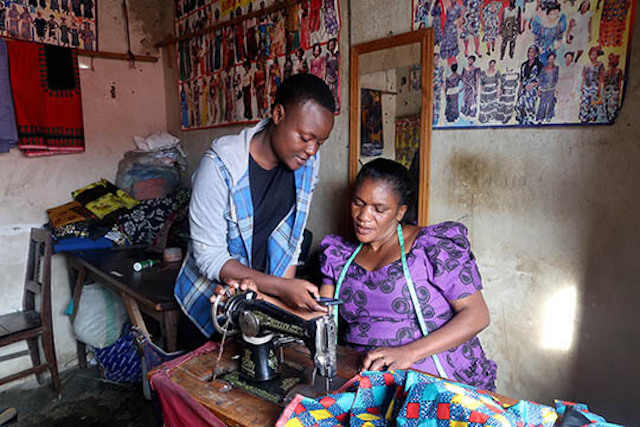 Ndinagwe Mboya helps another businesswoman in Business Women Connect program