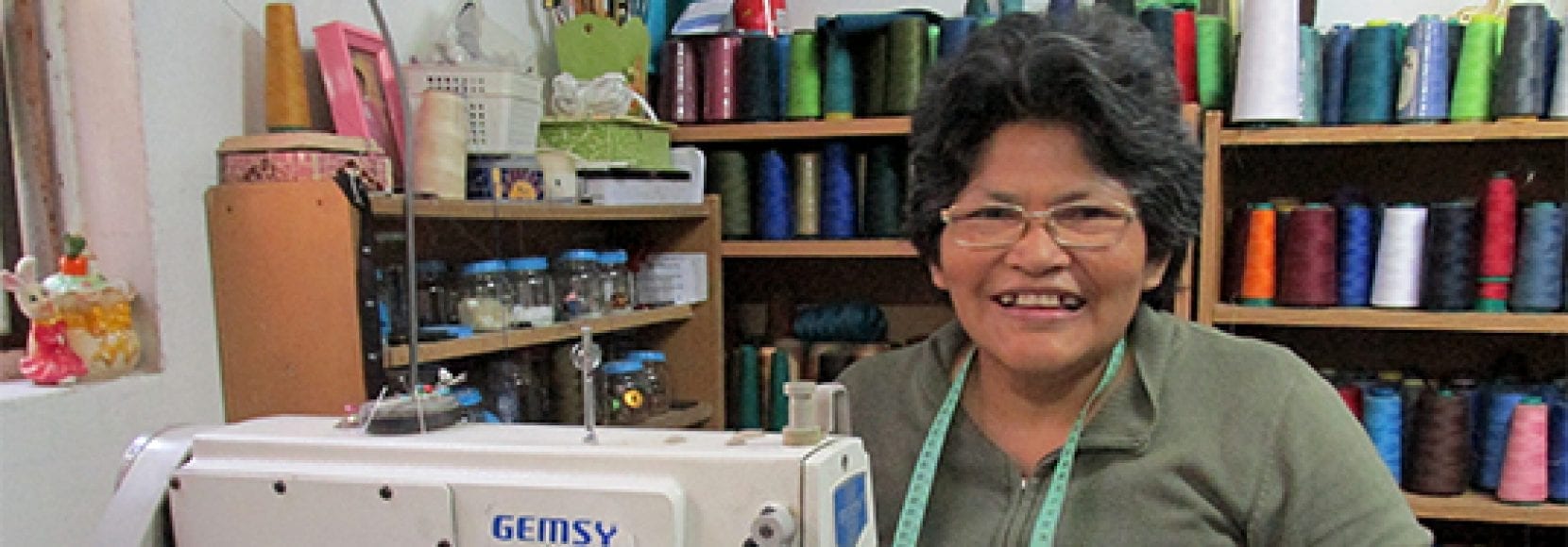 Woman sewing material