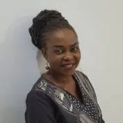 Smiling portrait of Nigerian country director