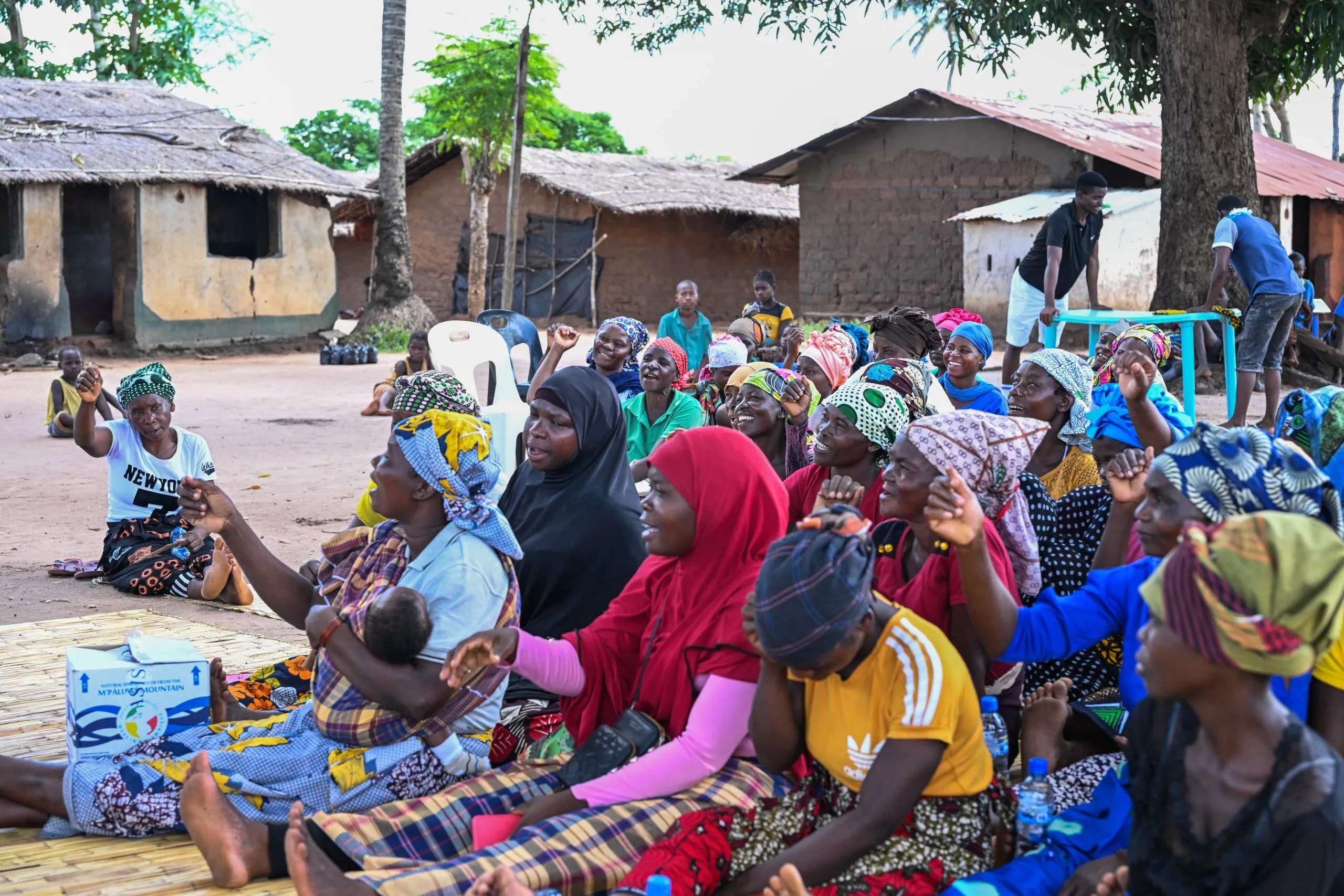 Women of the NIVENHE farming association during a seed ceremony with TechnoServe client Agrifeed.