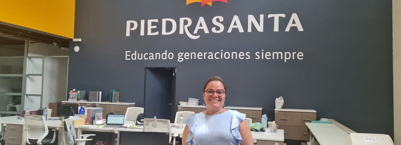 Yara Tobar stands in Piedrasanta, her bookstore and publishing business in Guatemala City, Guatemala. (TechnoServe)