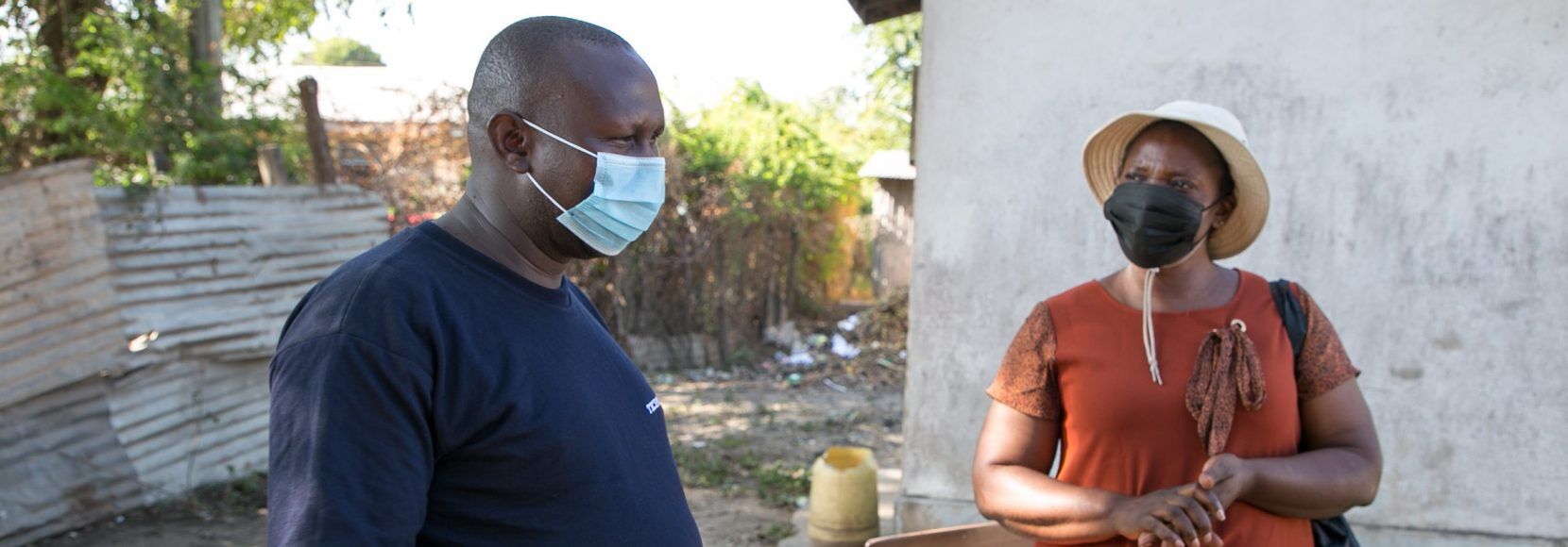 Judith Namayi Amboka speaks to a TechnoServe business advisor about the importance of supporting entrepreneurs in Kenya.