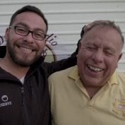 Two men smiling together in Chile