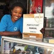 Woman standing by counter working hard