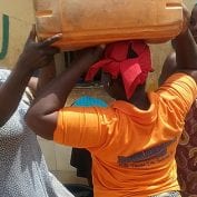 Women working together to clean water