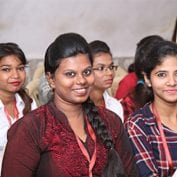 Woman smiling with Mumbai youth