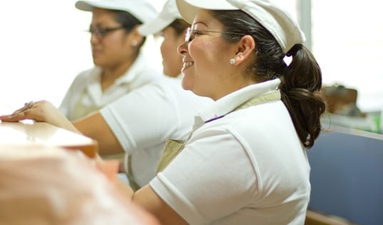 Female workers sitting in at the Central America Entrepreneurship program