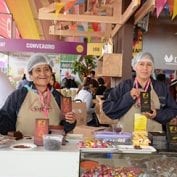 Two women working together smiling