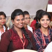 Smiling women at conference in India