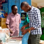 Two men in Kenya working at a store