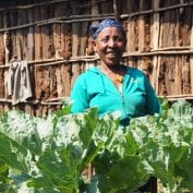 Woman smiling with her crops