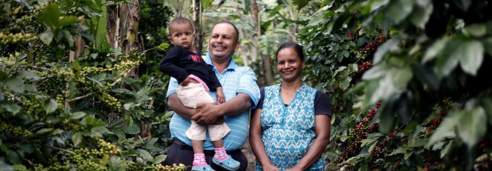 Young family smiling in Honduras
