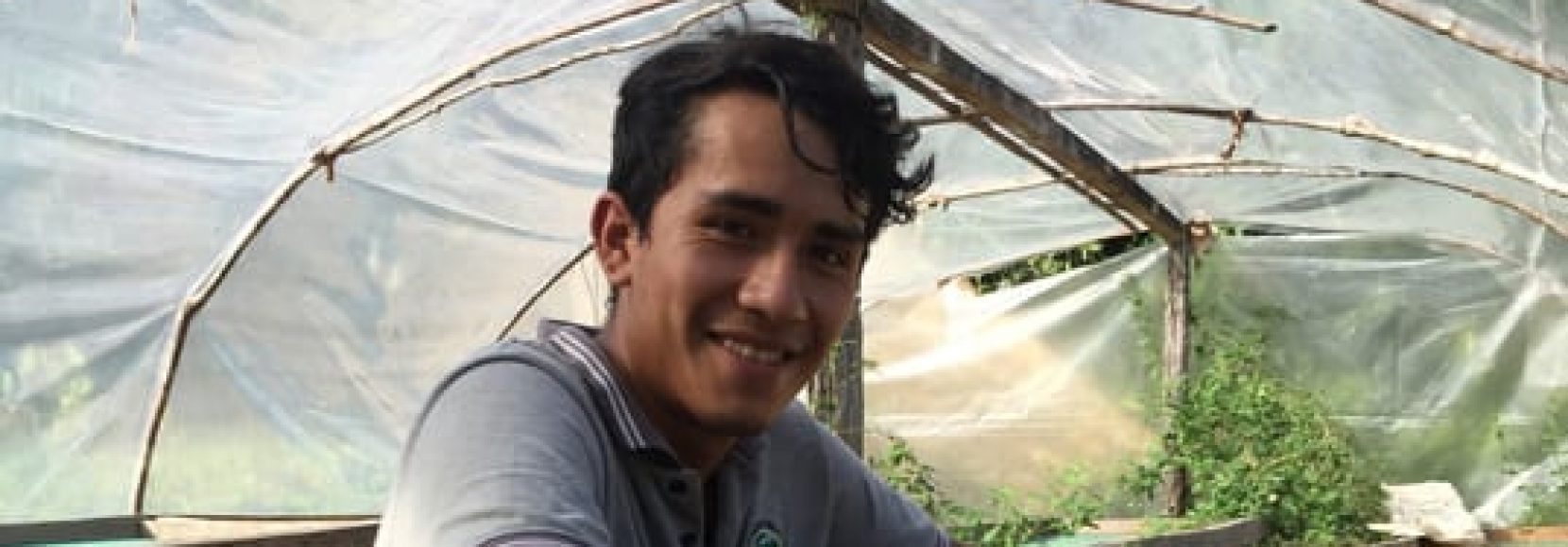 Wilmer in peru drying coffee beans