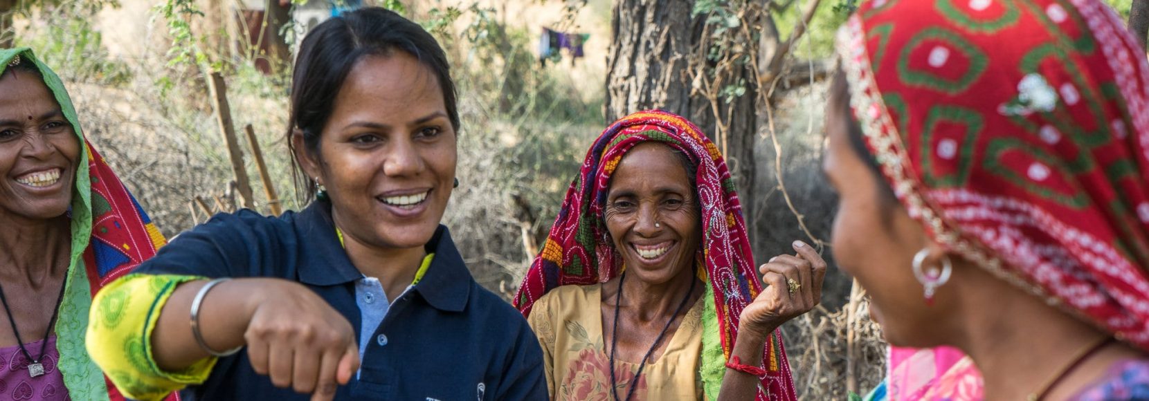 TechnoServe staff member provides field training to a group of women who are a part of Technoserve's kitchen garden program in India