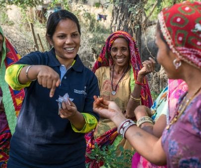 TechnoServe staff member provides field training to a group of women who are a part of Technoserve's kitchen garden program in India