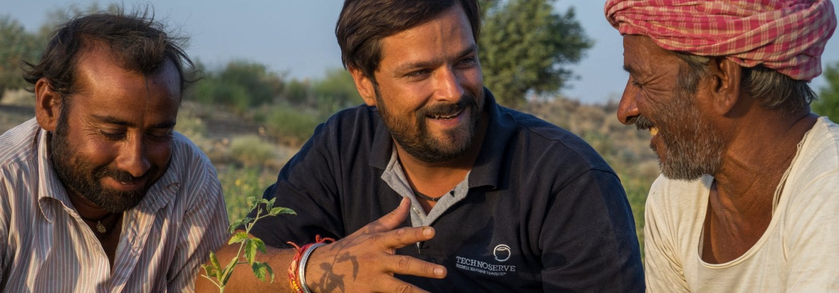 Technoserve Project Manager discusses plant diseases with guar farmers in India
