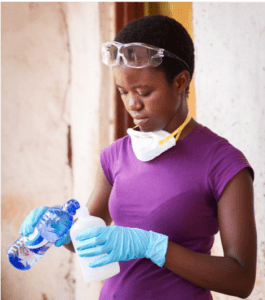 woman receives technical assistance in TechnoServe TAF program