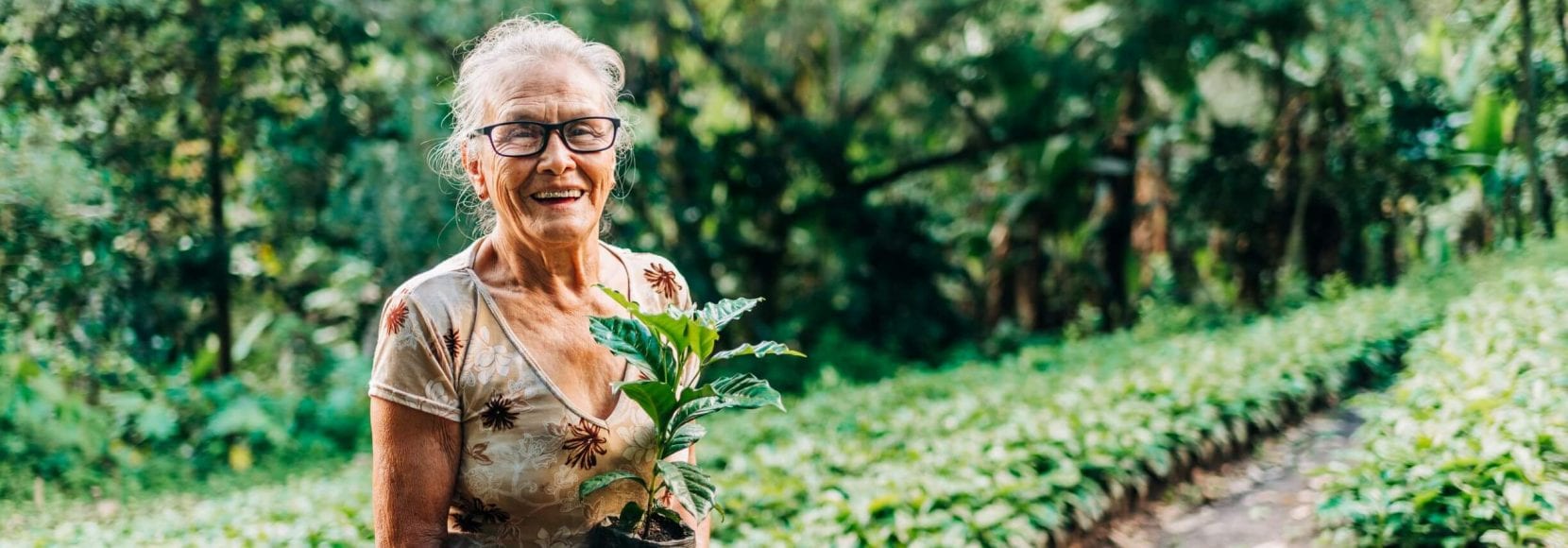 woman farmer stands near her fields in Nicaragua