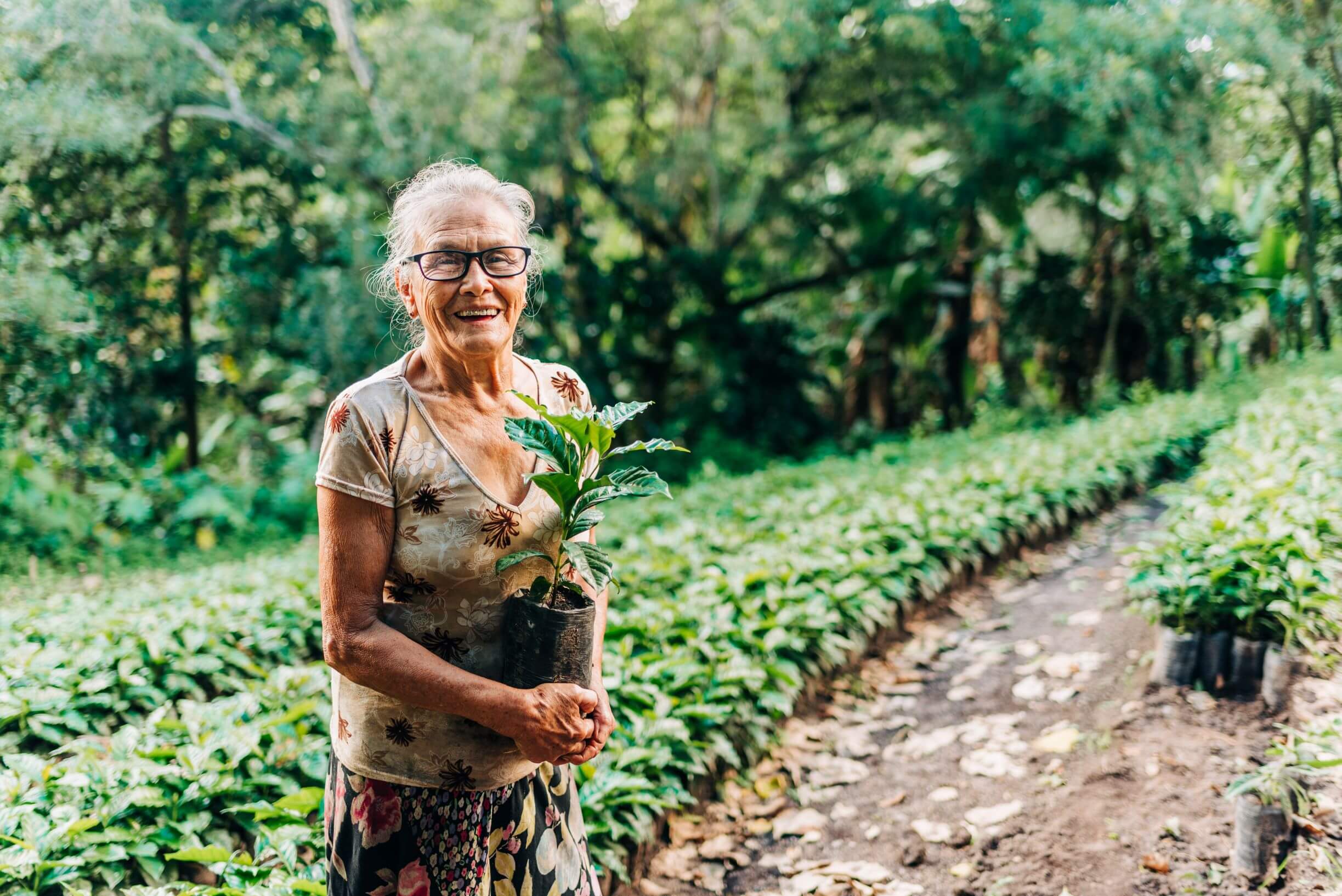 woman farmer stands near her fields in Nicaragua