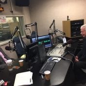 Two men in a radio broadcast room