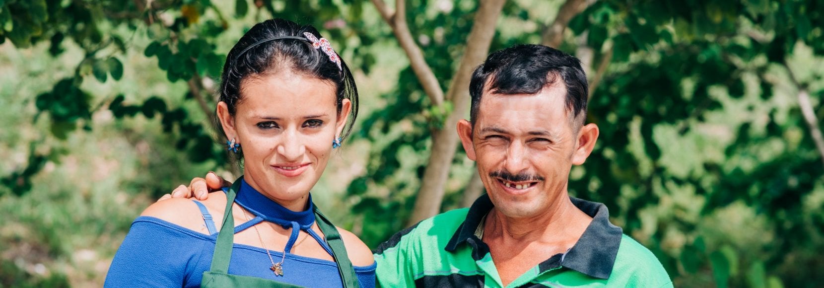 Couple working together on farm