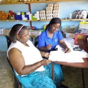 Two women conducting business sin Mozambique