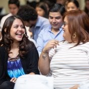 Group of women smiling and spending time together