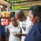 At TechnoServe, we're committed to fighting poverty to help people like this shopkeeper in Kenya