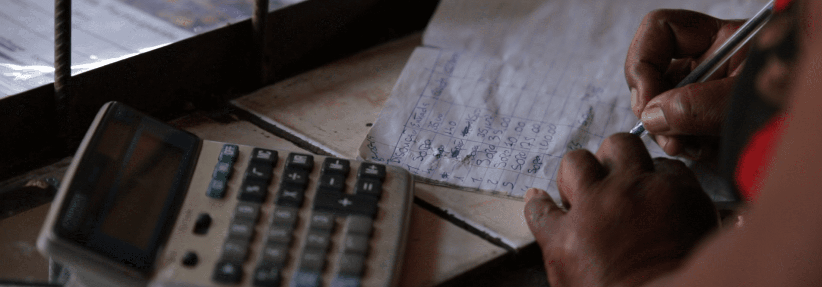 Person calculating business expenses