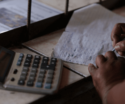 Person calculating business expenses
