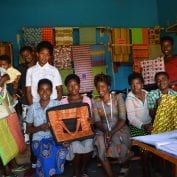 Group of happy people sewing in East Africa