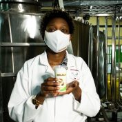 An employee at Prosoya displays a product