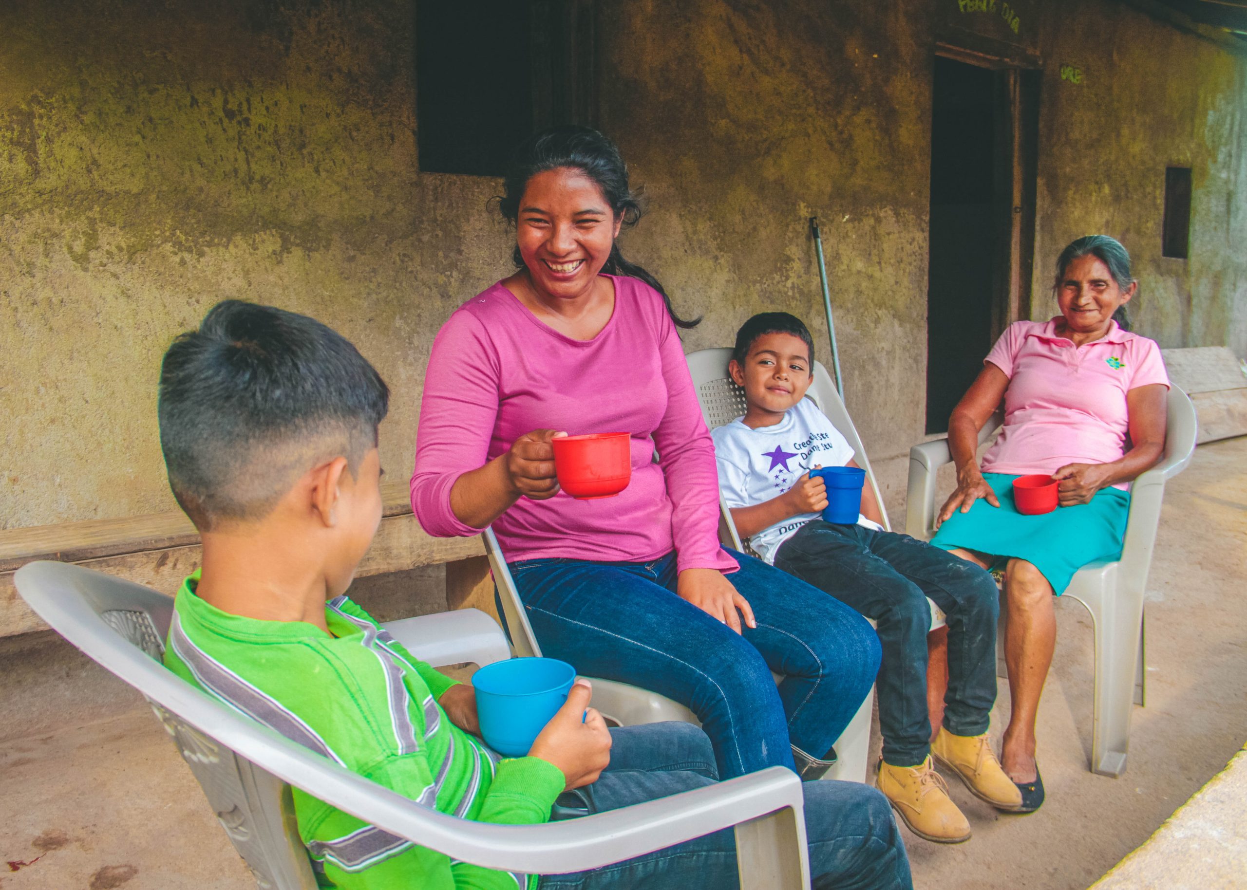 Rosa Gonzales with her son, nephew, and mother on their small farm in Nicaragua.