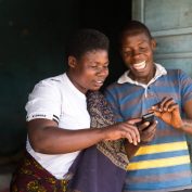 User personas lead to better tech solutions, such as the ones used in TechnoServe's program, Mobile Connected Farmer Alliance (CFA). M-Pawa user. Mbeya Region, Tanzania. September 2015.