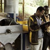 TechnoServe business advisor at cooperative coffee wet mill in Ethiopia