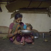 A woman feeds her daughter in the Rayagada district of Odisha, India. Photo Credit- Rohit Jain