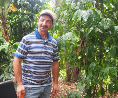 man outside on coffee farm, puerto rico