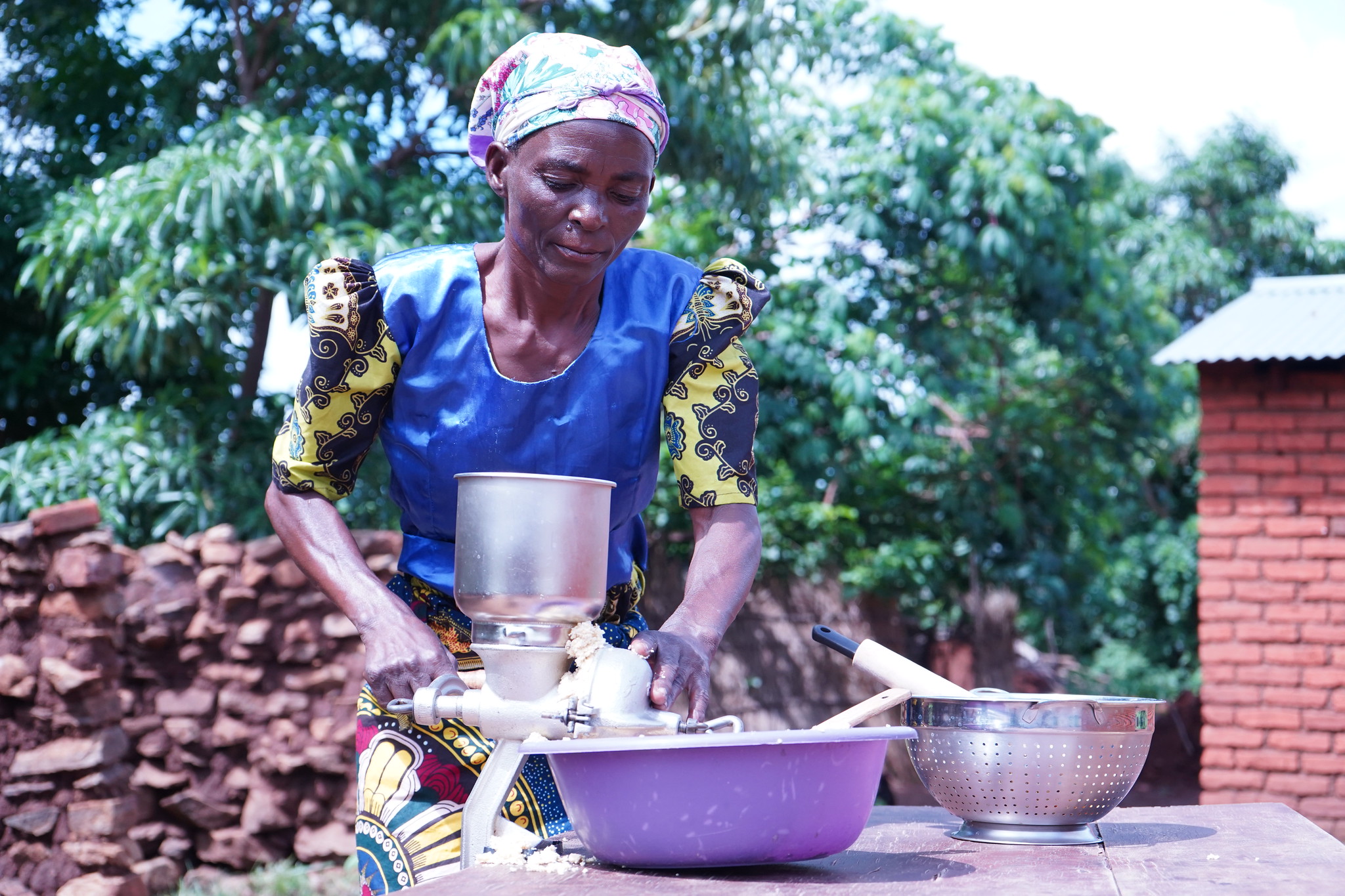 Turning locally produced soybeans into soymilk in Malawi. Soymilk is an inexpensive protein source, helping to improve nutrition. Photo Credit: Theodora Kachingwe, Feed the Future Malawi Ag-Diversification Activity