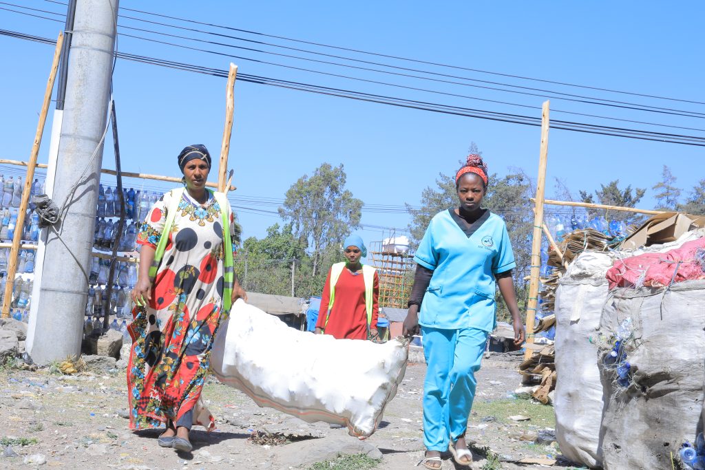 LIWAY program participants sorting recyclables, promoting environmental sustainability in Ethiopia