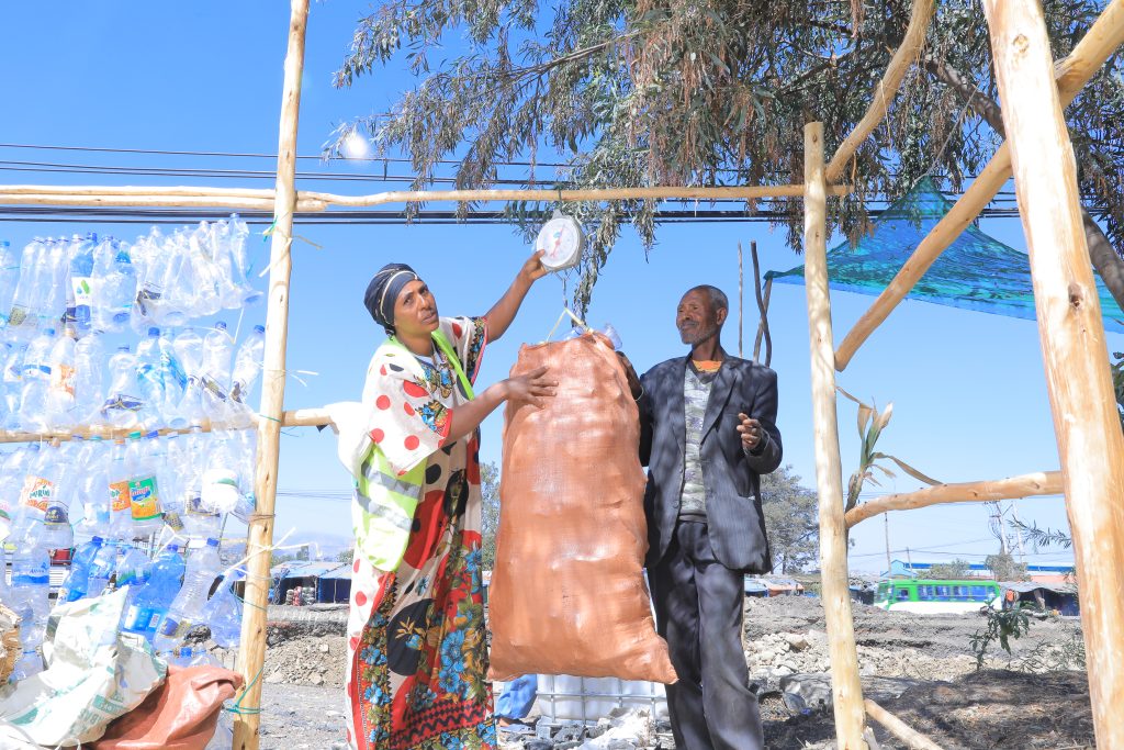 LIWAY program participants sorting recyclables, promoting environmental sustainability in Ethiopia