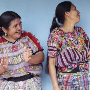 Four women in Guatemala stand together. Part of TechnoServe's December 2023 news quiz.