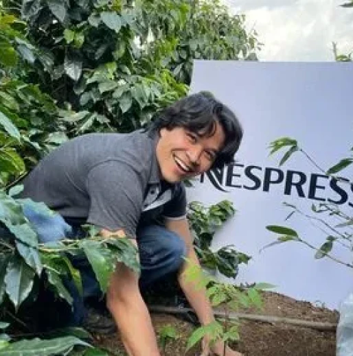 Man Helping with Nespesso Partnership