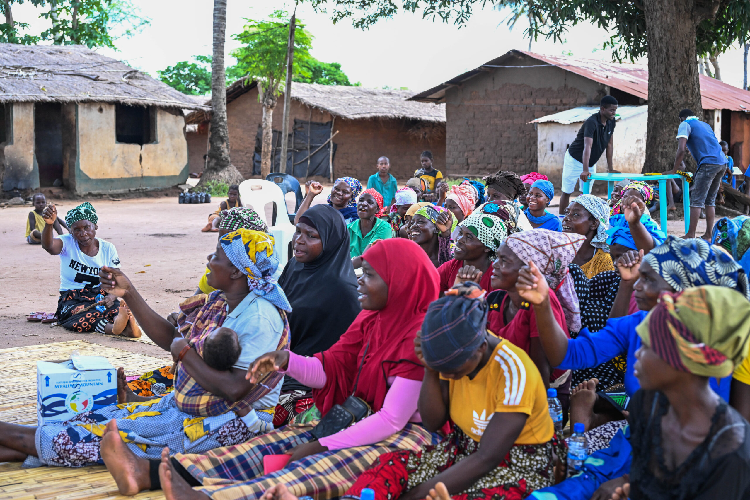 Women of the NIVENHE farming association during a seed ceremony with TechnoServe client Agrifeed.