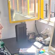 A woman sits at a computer in Colombia. Part of a blog post sharing young entrepreneurs' stories.