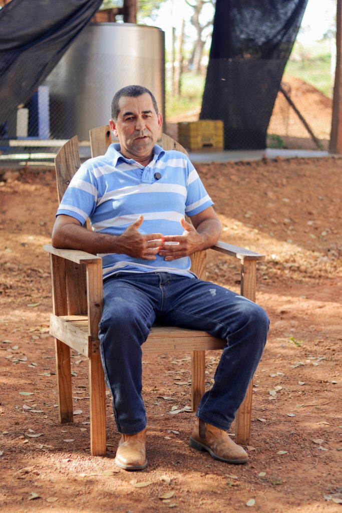 Jancarlo Silva (son), Suelene Silva (wife), and Valdimar Silva (husband) on their farm in Barro Alto, Brazil. Suelene and Vladimar are clients of the Crescer program funded by Anglo American. Photos by Khalila Lopes for TechnoServe. June 2025.