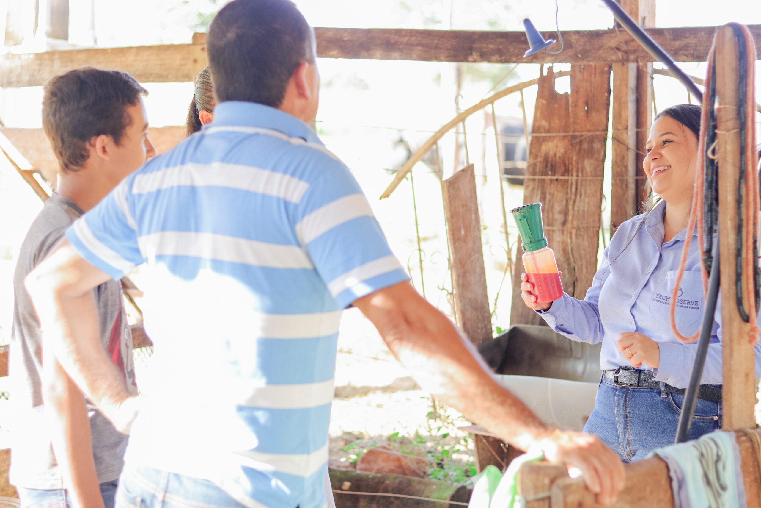 Jancarlo Silva (son), Suelene Silva (wife), and Valdimar Silva (husband) on their farm in Barro Alto, Brazil. Suelene and Vladimar are clients of the Crescer program funded by Anglo American. Photos by Khalila Lopes for TechnoServe. June 2025.
