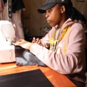 A woman in South Africa sews. Part of a blog post on entrepreneurship in South Africa.