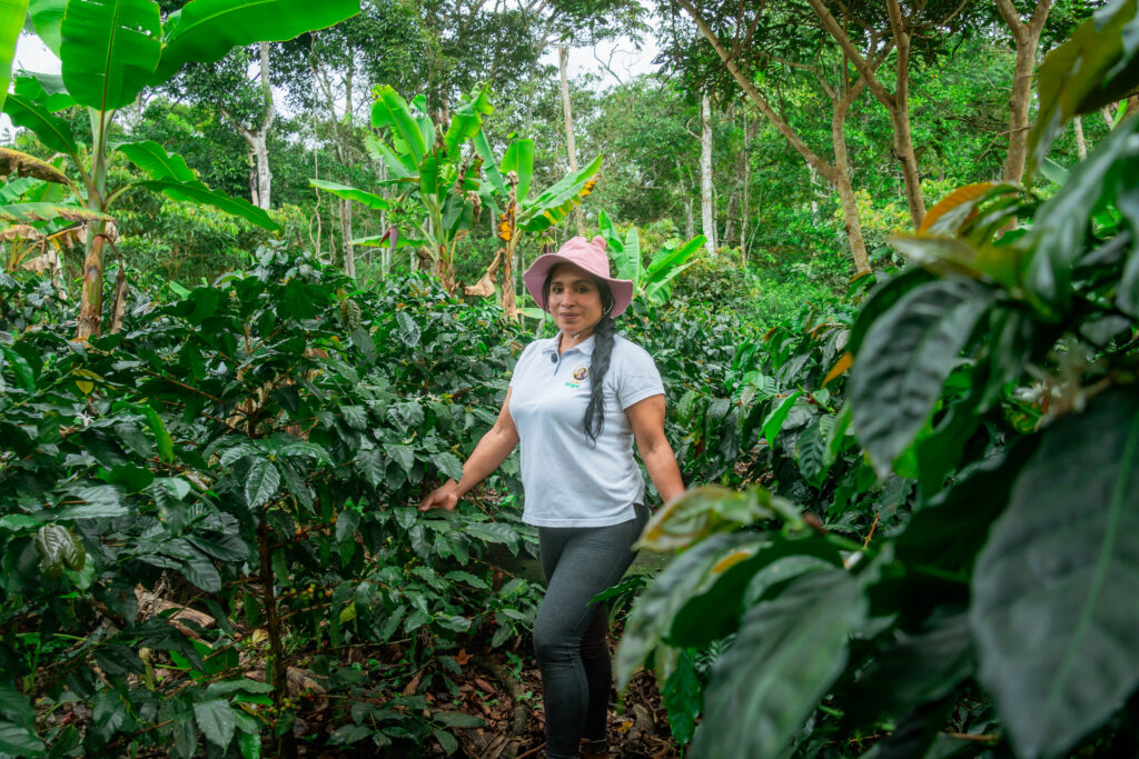 Genith Apagueño Cahuaza on her coffee farm in Peru's San Martín region. (TechnoServe / Edson Arratea)
