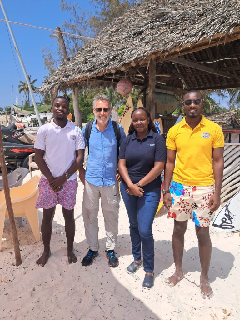 Samuel Wiseman (far left) and Musa Barisa (far right) of the Life Saving Cadets with Patrick Denis (author) and TechnoServe’s Joanne Muchai at Nyali Beach, Mombasa, Kenya.
